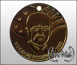 2D Teddy Roosevelt coin minted on shiny gold.