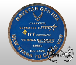 Several logos decorate this coin with blue enamel. Wave edge cut on an antique gold coin.
